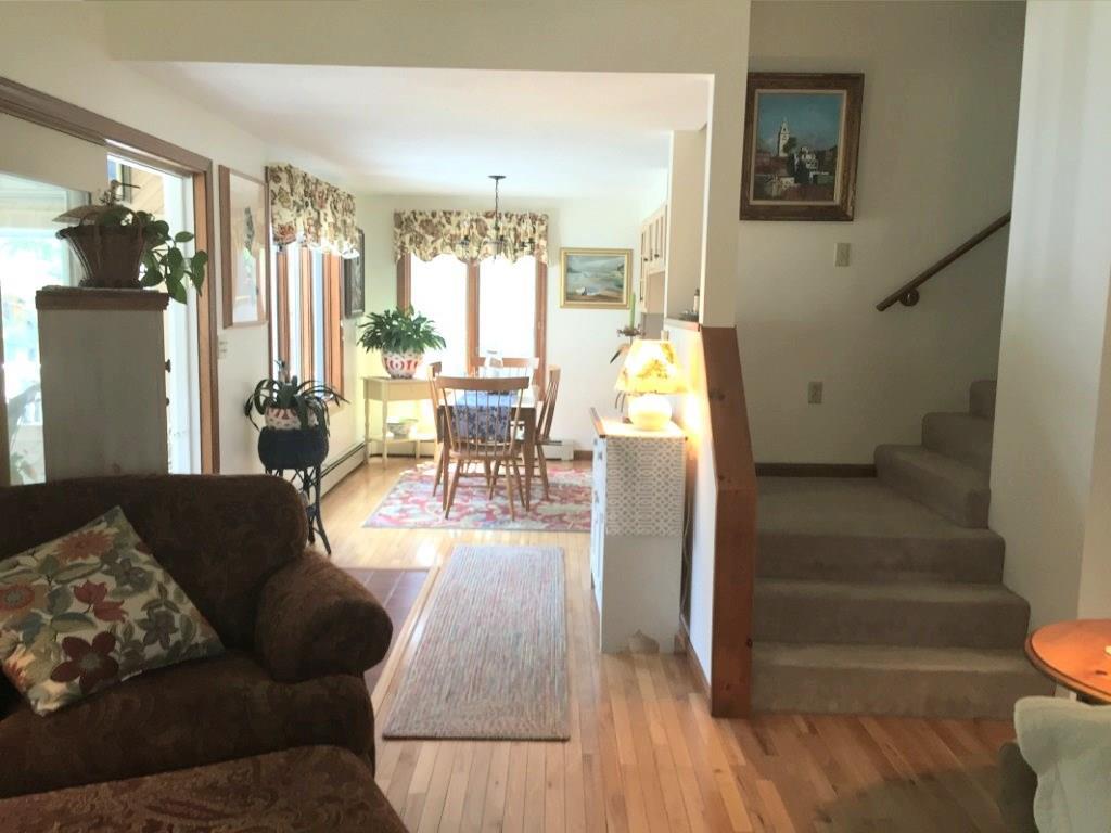 1717 Embden Pond Road Embden, ME 04958 - Photo 12 of 42 Living room with view of dining area