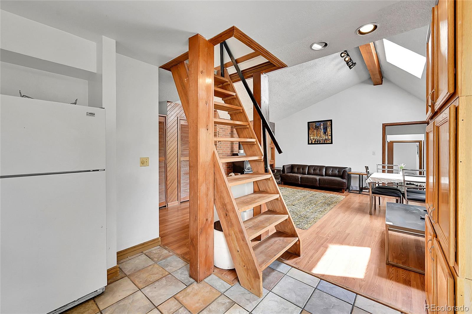 101 Campbell Road Bailey, CO 80421 - Photo 21 of 49 a view of living room with furniture and wooden floor
