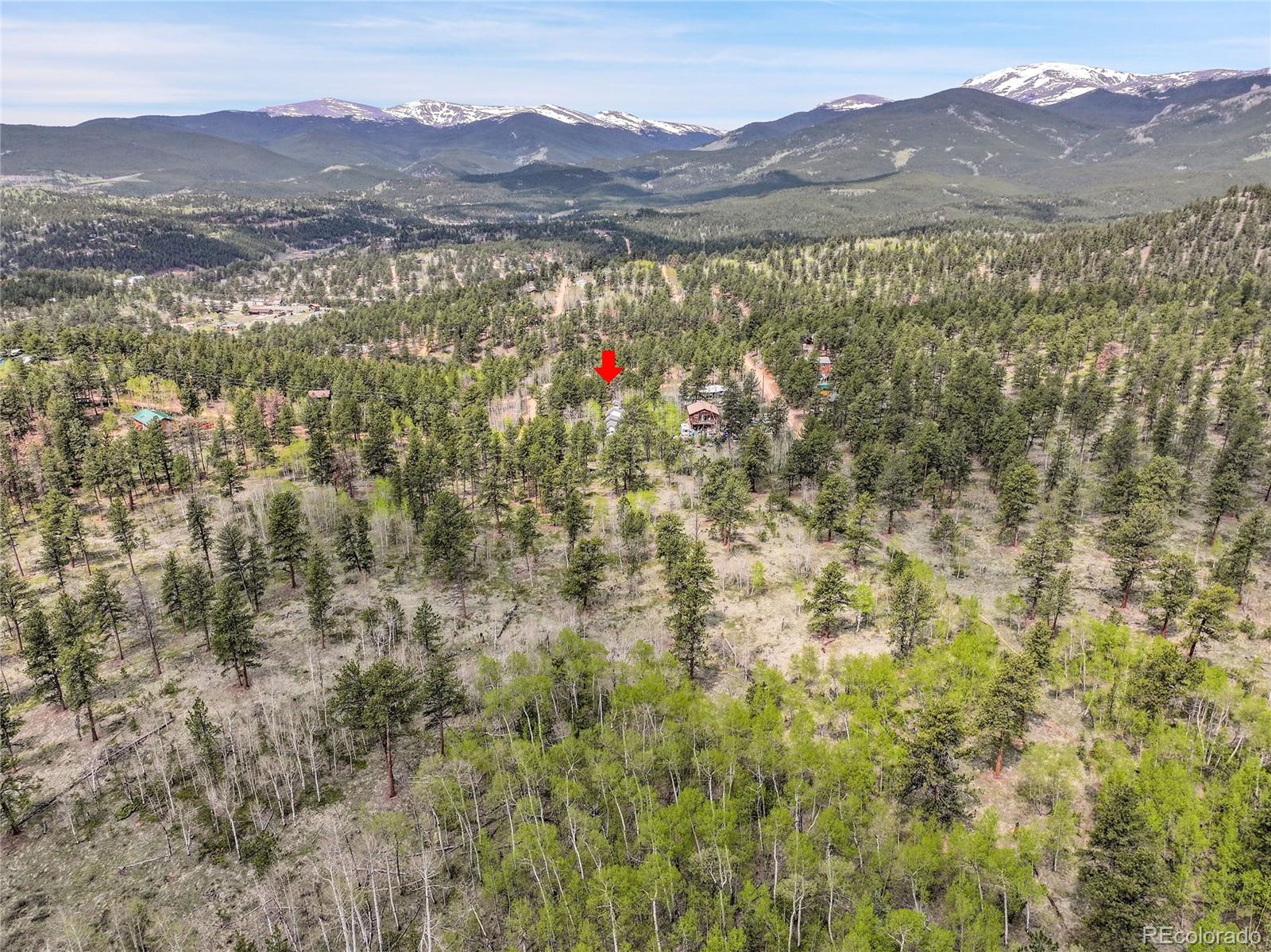 101 Campbell Road Bailey, CO 80421 - Photo 43 of 49 a view of a town with mountains in the background
