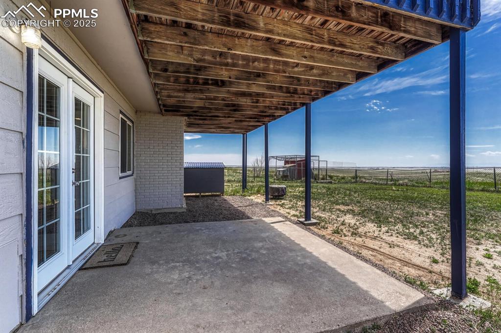 7550 Soap Weed Road Calhan, CO 80808 - Photo 44 of 50 a view of a porch