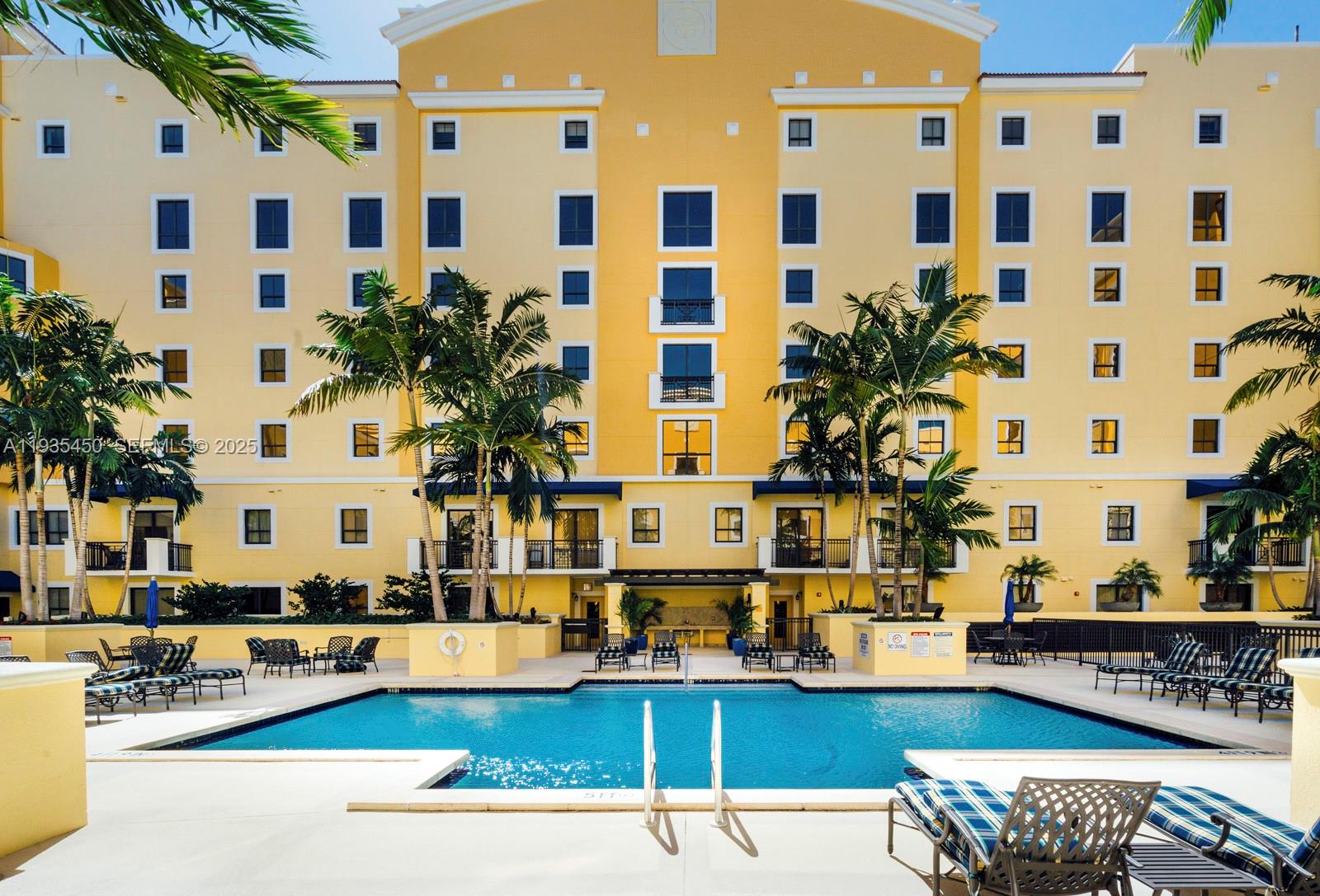 8395 Southwest 73rd Avenue, Unit 521 Miami, FL 33143 - Photo 19 of 21 a building view with outdoor space and seating area