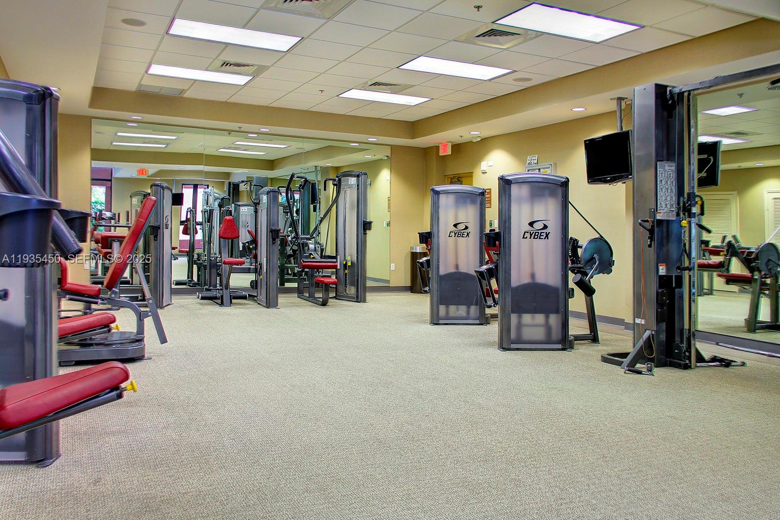 8395 Southwest 73rd Avenue, Unit 521 Miami, FL 33143 - Photo 21 of 21 a view of a room with gym equipment