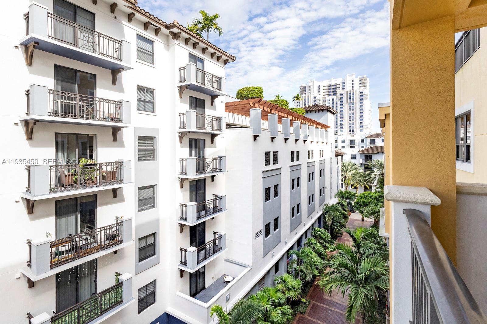8395 Southwest 73rd Avenue, Unit 521 Miami, FL 33143 - Photo 7 of 21 a view of a large building with many windows