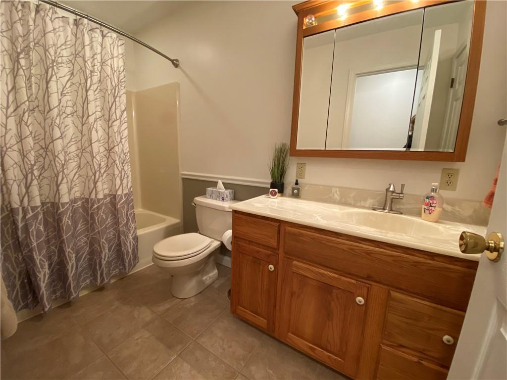 202 West Methodist Road Greenville, PA 16125 - Photo 20 of 25 a bathroom with a toilet a sink and mirror