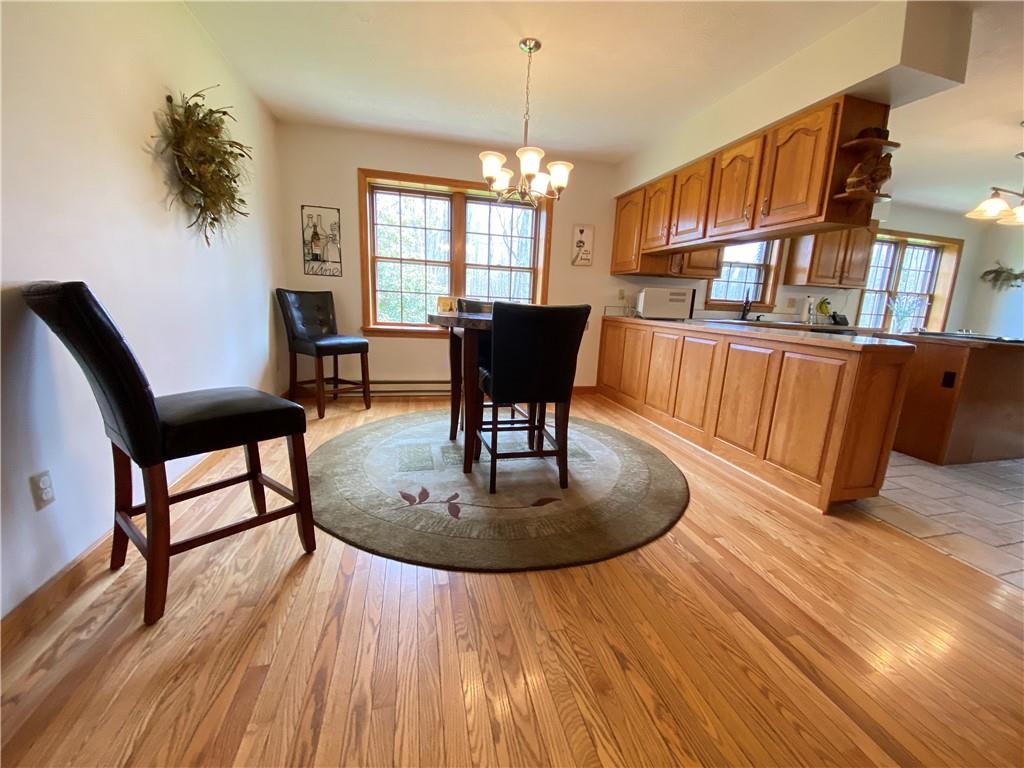 202 West Methodist Road Greenville, PA 16125 - Photo 7 of 25 a living room with furniture a window and a chandelier