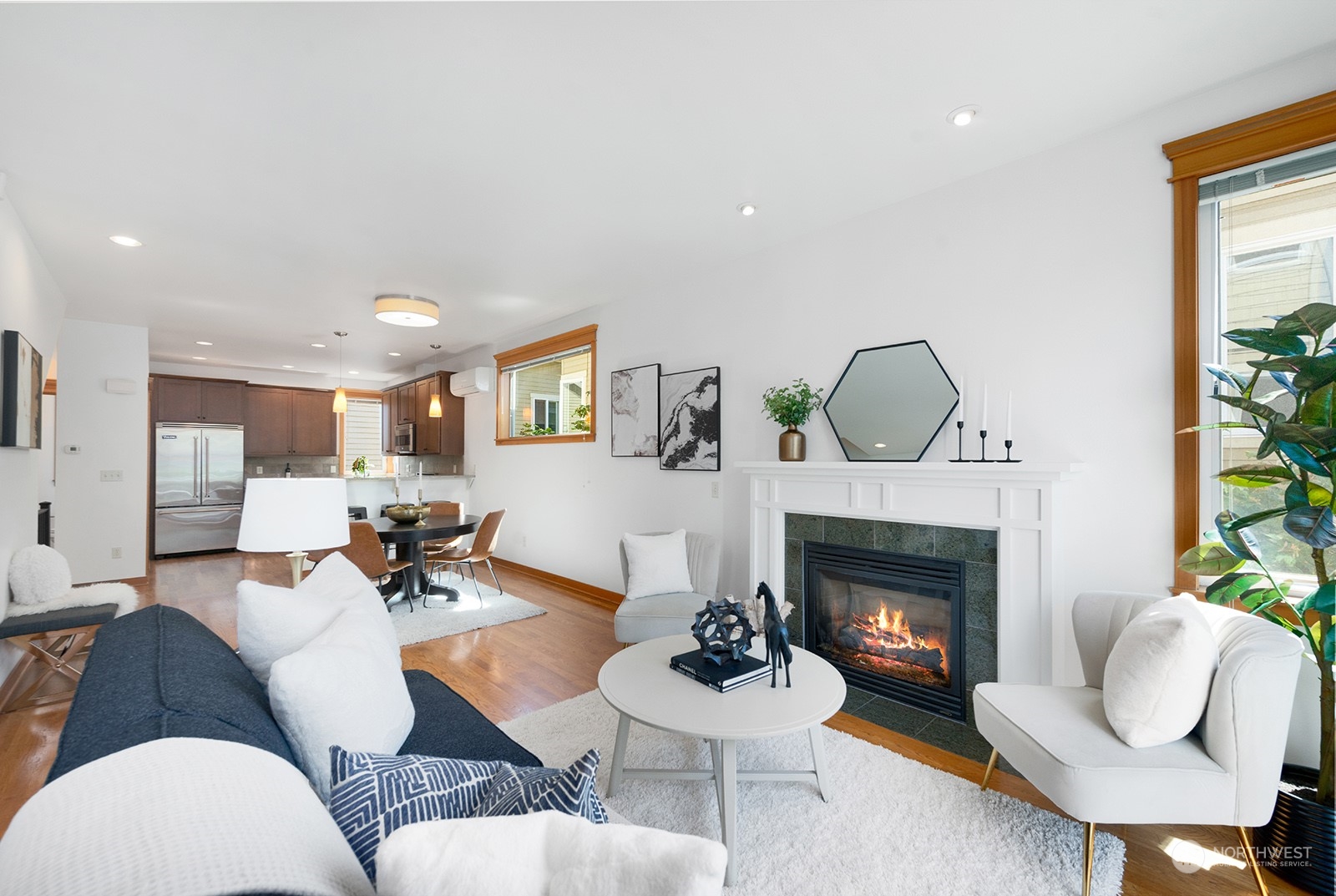 4309 Southwest Seattle Street Seattle, WA 98116 - Photo 14 of 36 a living room with furniture and a fireplace