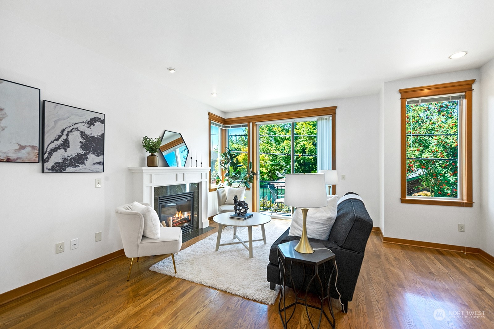 4309 Southwest Seattle Street Seattle, WA 98116 - Photo 16 of 36 a living room with furniture and a fireplace