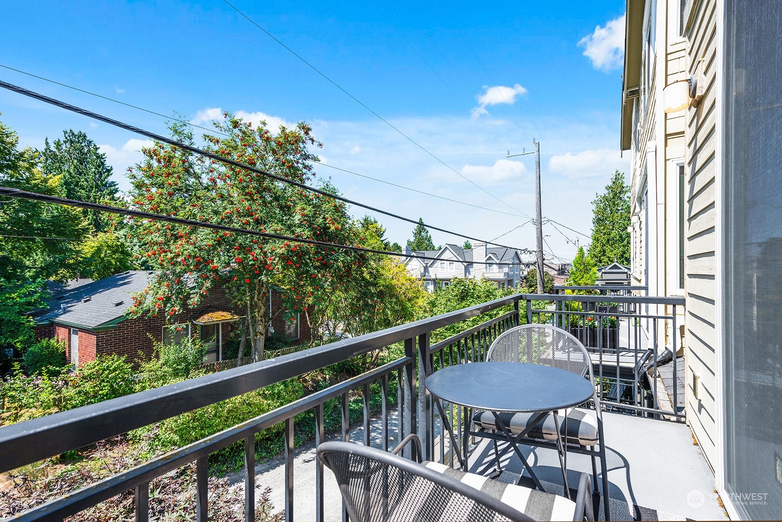 4309 Southwest Seattle Street Seattle, WA 98116 - Photo 17 of 36 a view of a balcony with furniture
