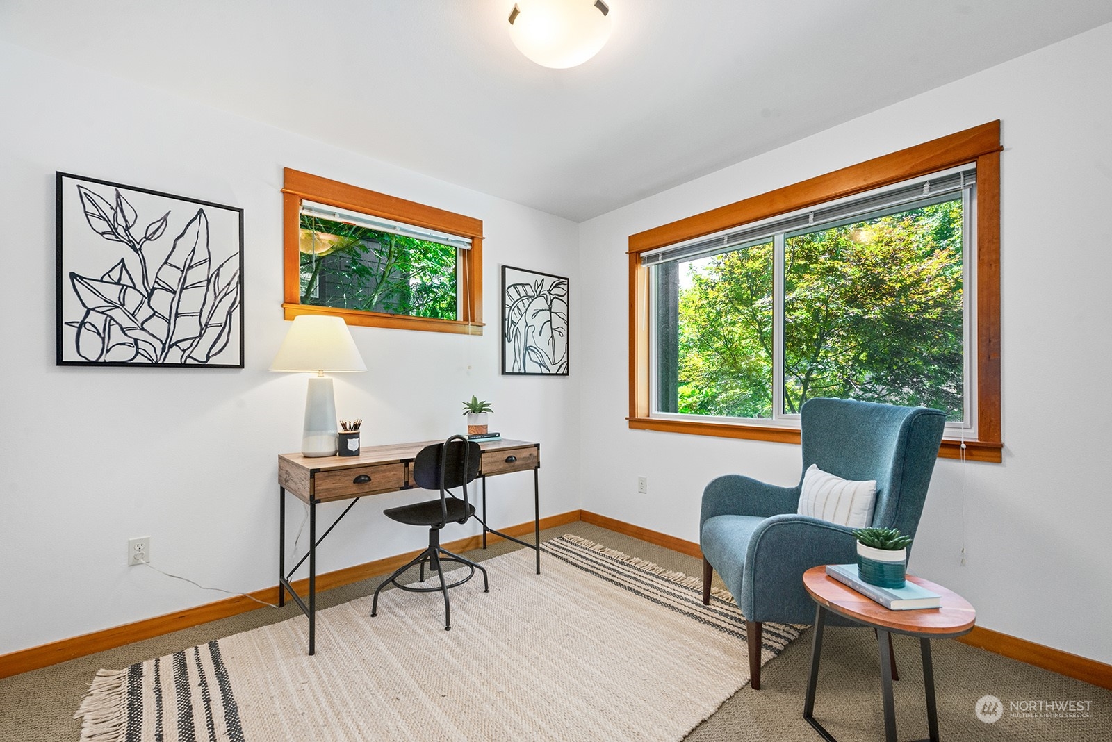 4309 Southwest Seattle Street Seattle, WA 98116 - Photo 26 of 36 a living room with furniture and a window