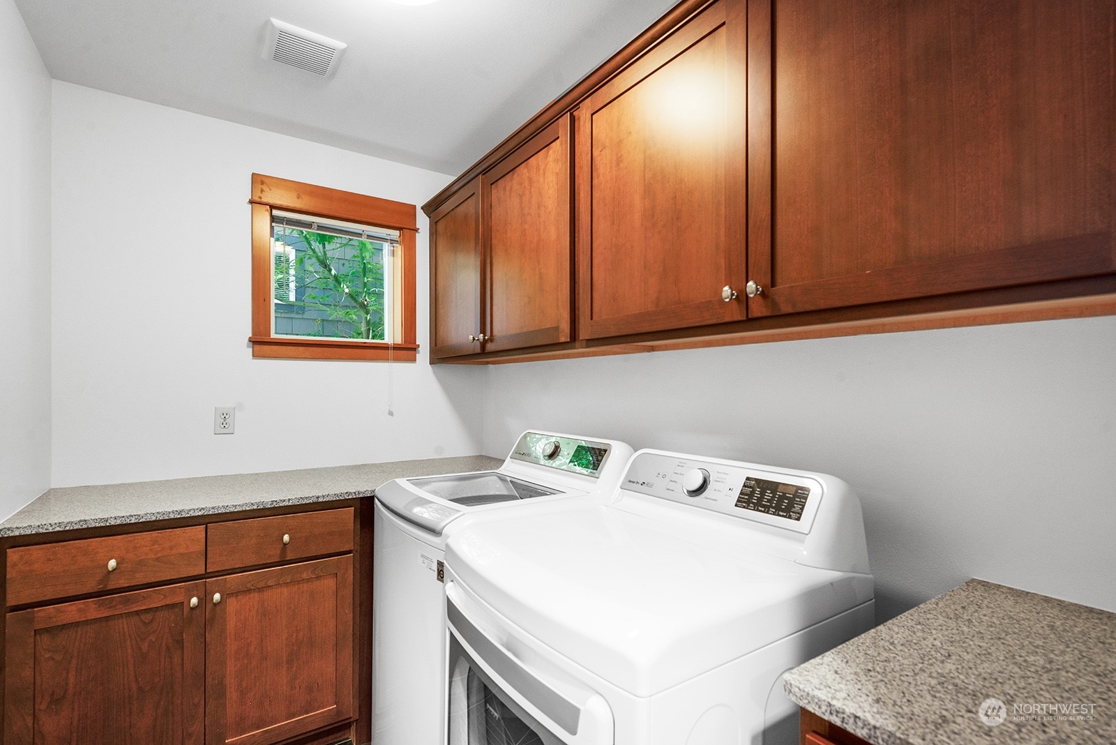 4309 Southwest Seattle Street Seattle, WA 98116 - Photo 28 of 36 a utility room with dryer and washer
