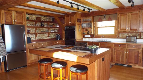 29 Potter Road Rowe, MA 01367 - Photo 4 of 30 a kitchen with stainless steel appliances granite countertop a sink stove and refrigerator