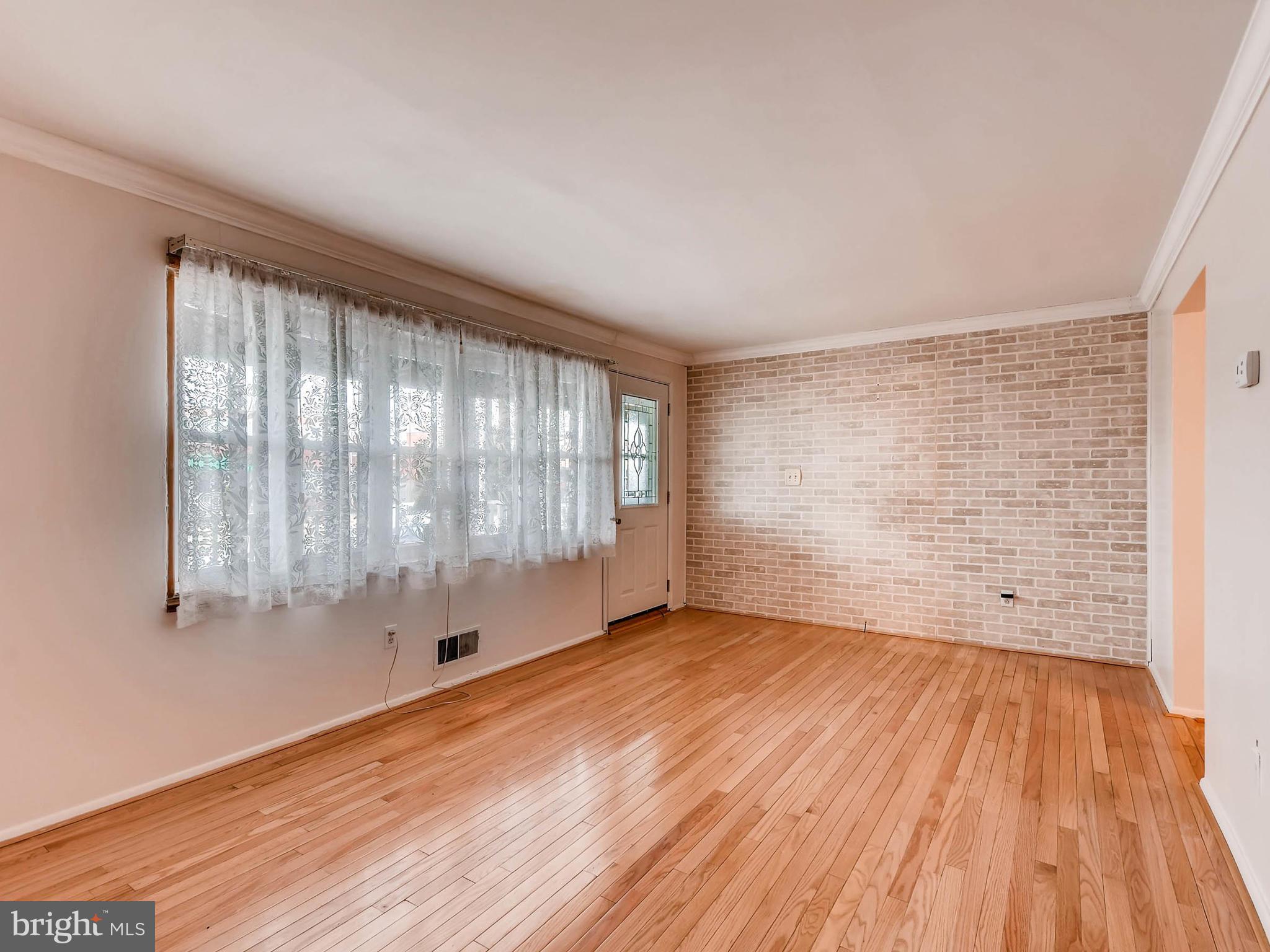 8107 Mid Haven Road Baltimore, MD 21222 - Photo 8 of 28 Lots of light from Bay Window