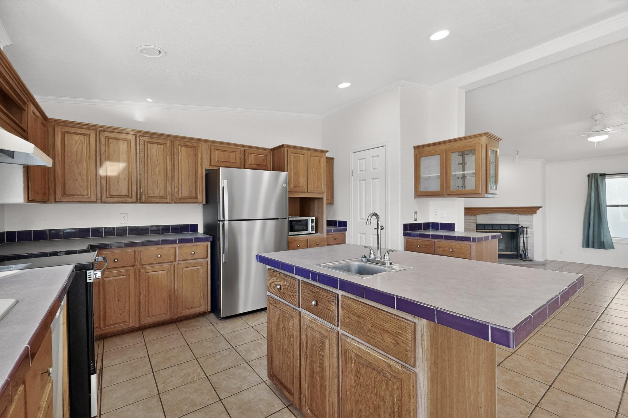 103 Hidden Valley Ranch Road Ilfeld, NM 87538 - Photo 14 of 49 Showing appliances and 2nd sink and Kitchen island