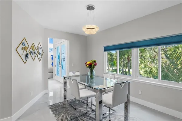 a kitchen with a sink and a large window