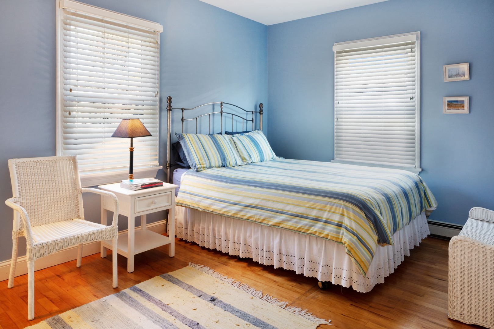 17 Thaxter Lane Edgartown, MA 02539 - Photo 15 of 23 a bedroom with a bed a table and chair