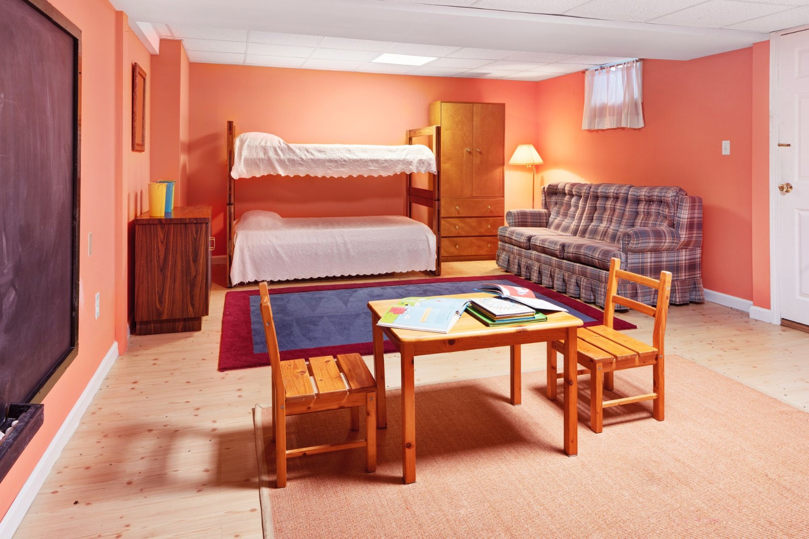 17 Thaxter Lane Edgartown, MA 02539 - Photo 17 of 23 a bedroom with furniture and a lamp