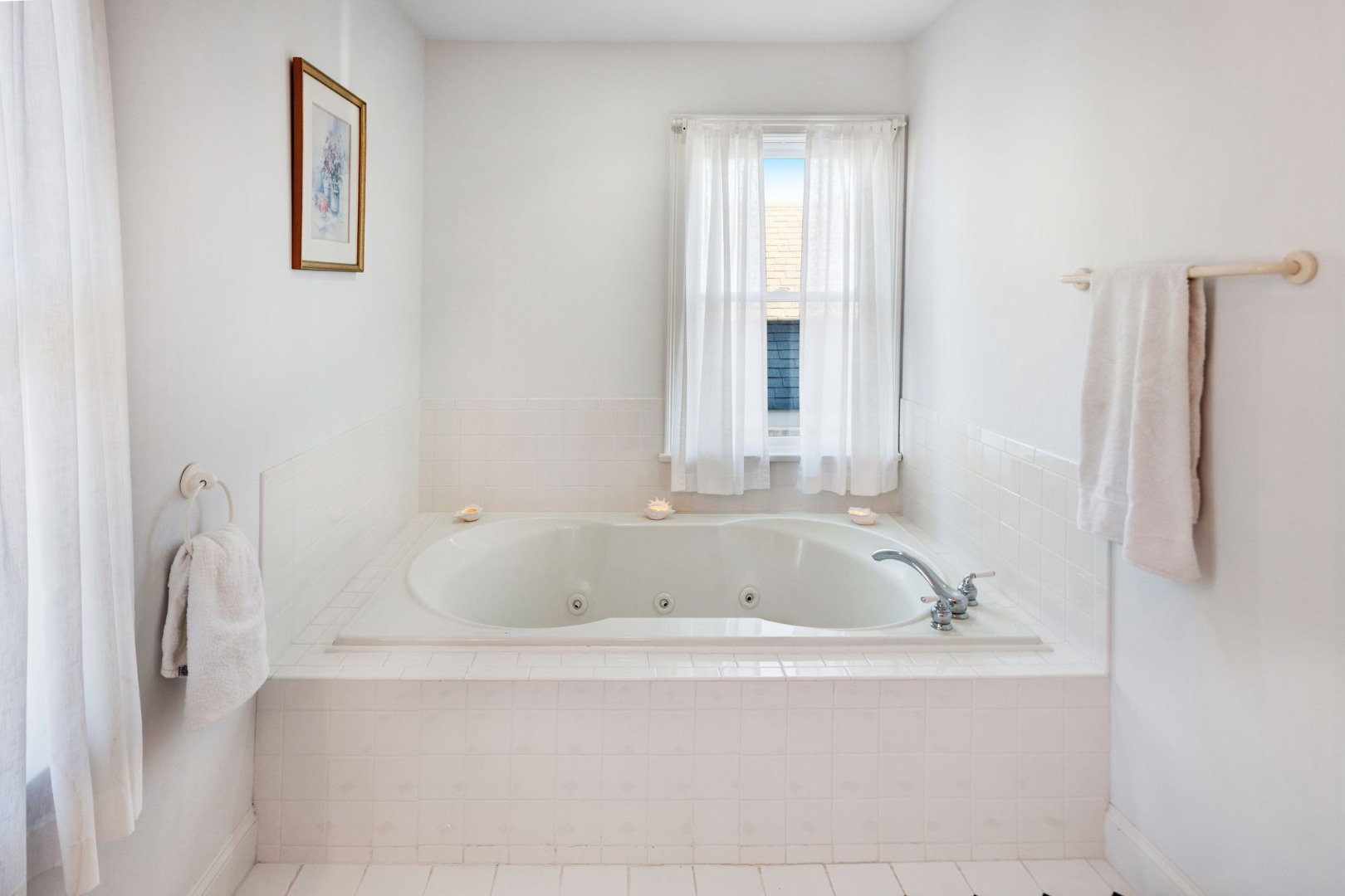 17 Thaxter Lane Edgartown, MA 02539 - Photo 18 of 23 a bathroom with a bathtub and a shower