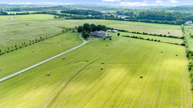 a view of a lake with a big yard
