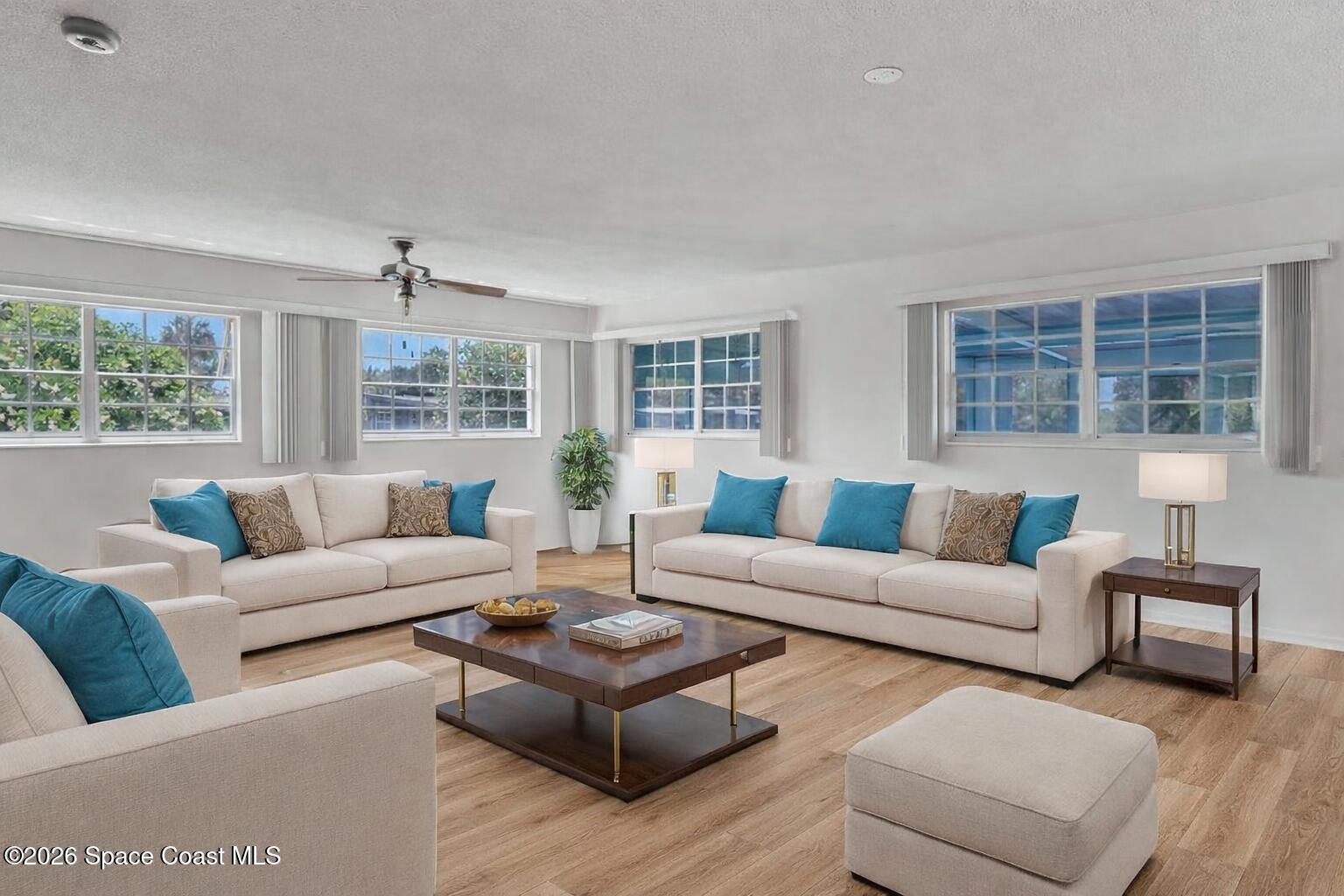 850 Cardinal Road Cocoa, FL 32926 - Photo 11 of 41 a living room with furniture and windows
