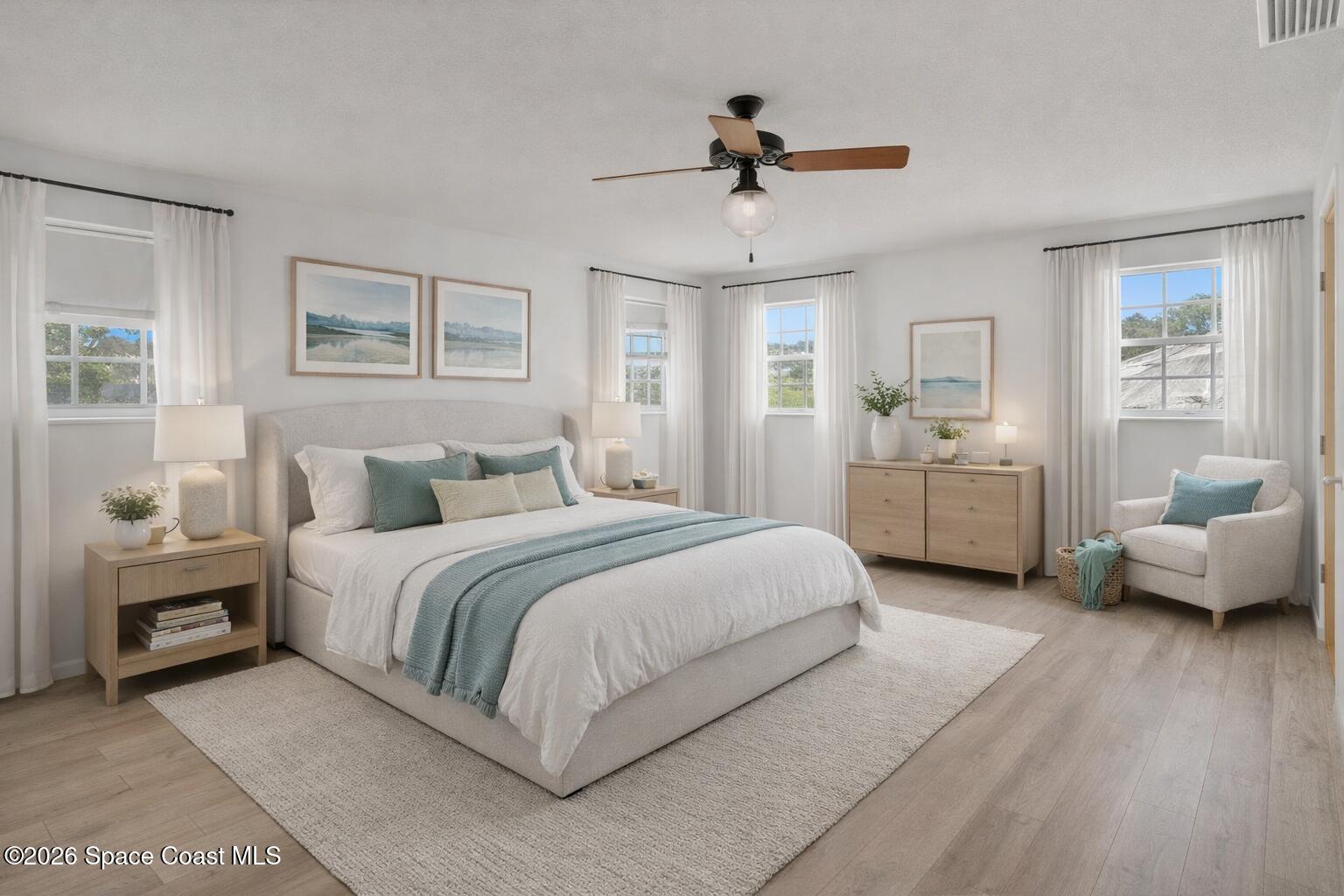 850 Cardinal Road Cocoa, FL 32926 - Photo 15 of 41 a spacious bedroom with a bed and furniture