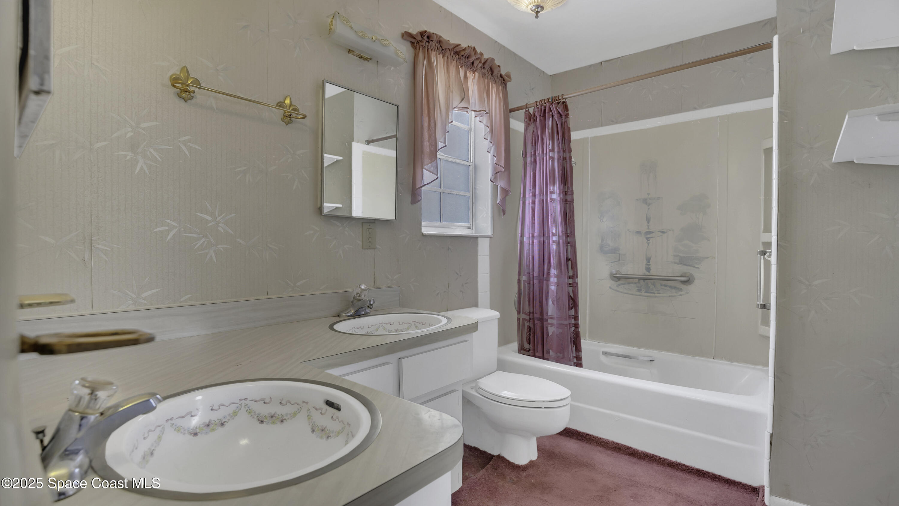 850 Cardinal Road Cocoa, FL 32926 - Photo 18 of 41 a bathroom with a sink toilet and shower