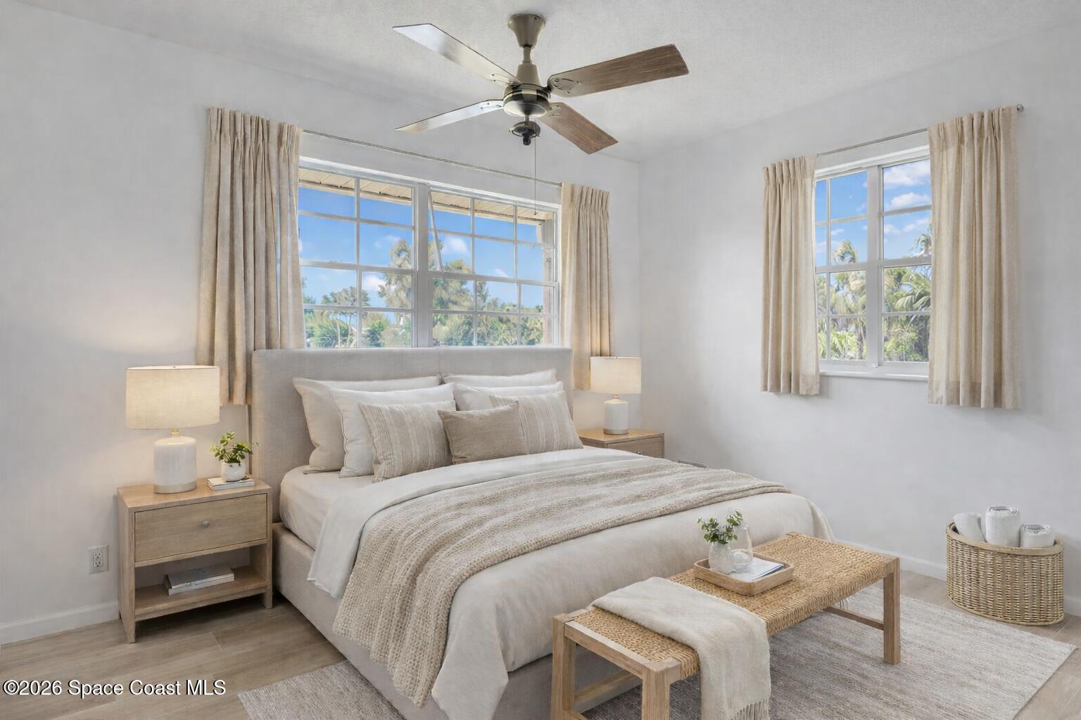 850 Cardinal Road Cocoa, FL 32926 - Photo 19 of 41 a bedroom with a bed and a table