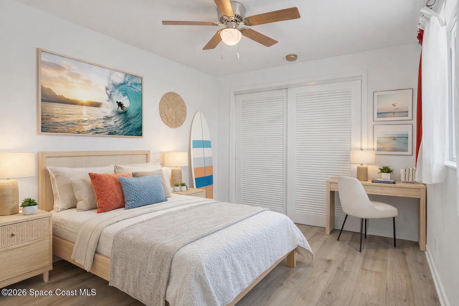 850 Cardinal Road Cocoa, FL 32926 - Photo 23 of 41 a bedroom with a bed and a painting on the wall