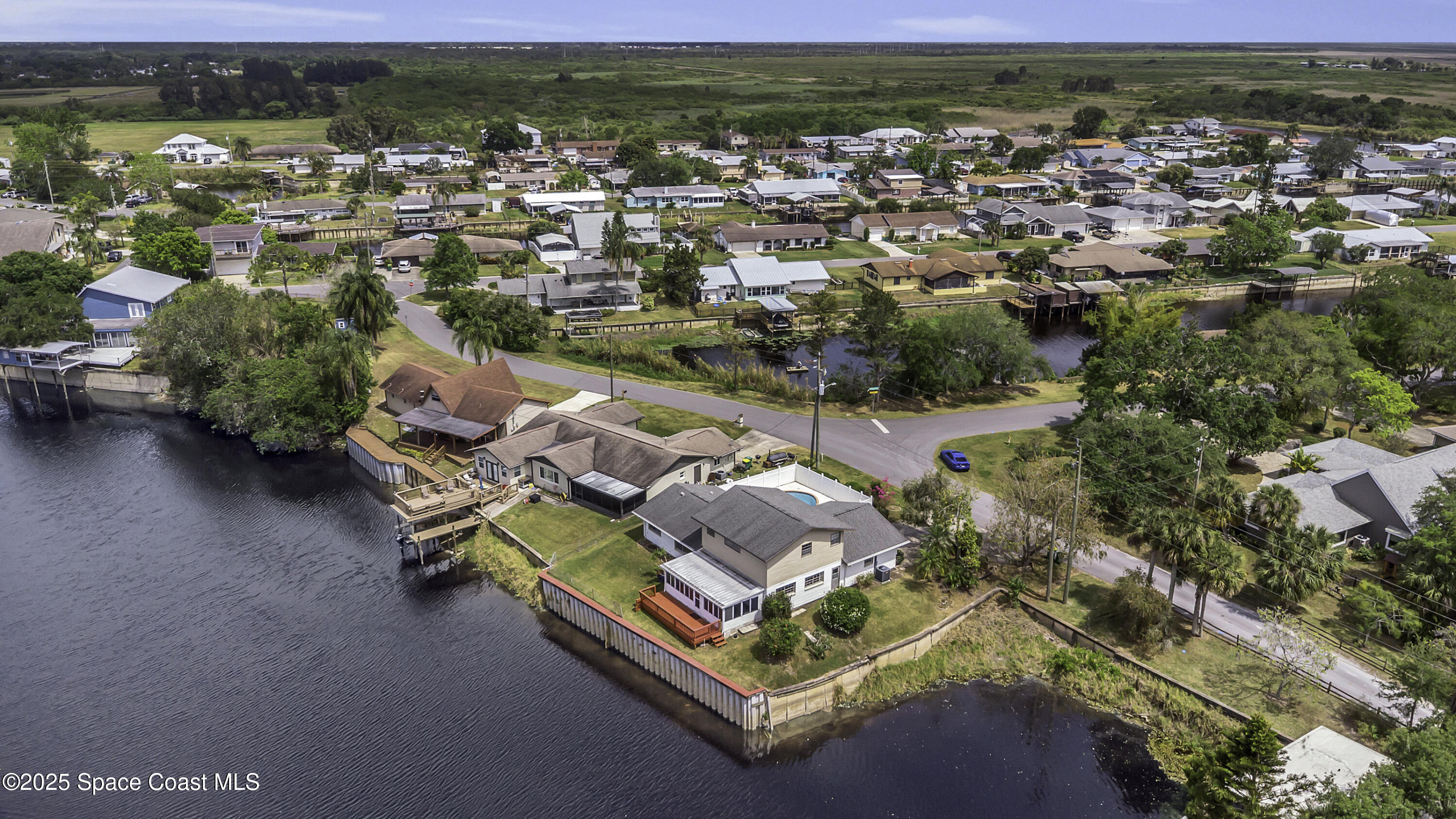 850 Cardinal Road Cocoa, FL 32926 - Photo 34 of 41 an aerial view of residential house with outdoor space and river