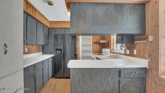 a living room with furniture and windows