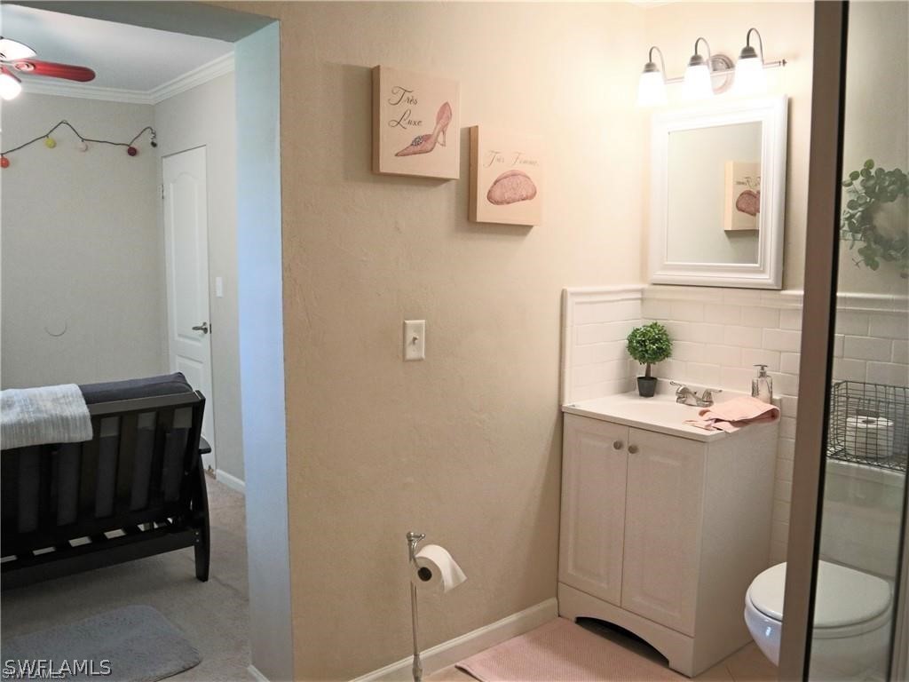 1453 Mandel Road Fort Myers, FL 33919 - Photo 13 of 16 a view of an entryway with wooden floor