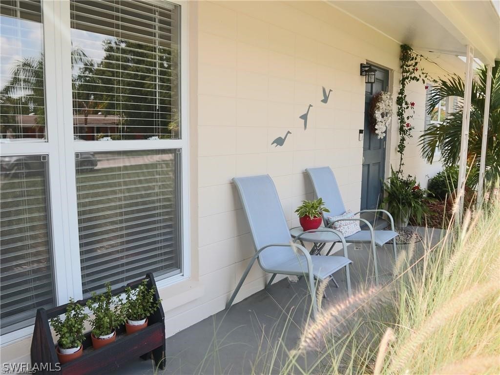 1453 Mandel Road Fort Myers, FL 33919 - Photo 2 of 16 a view of balcony with couple of chairs