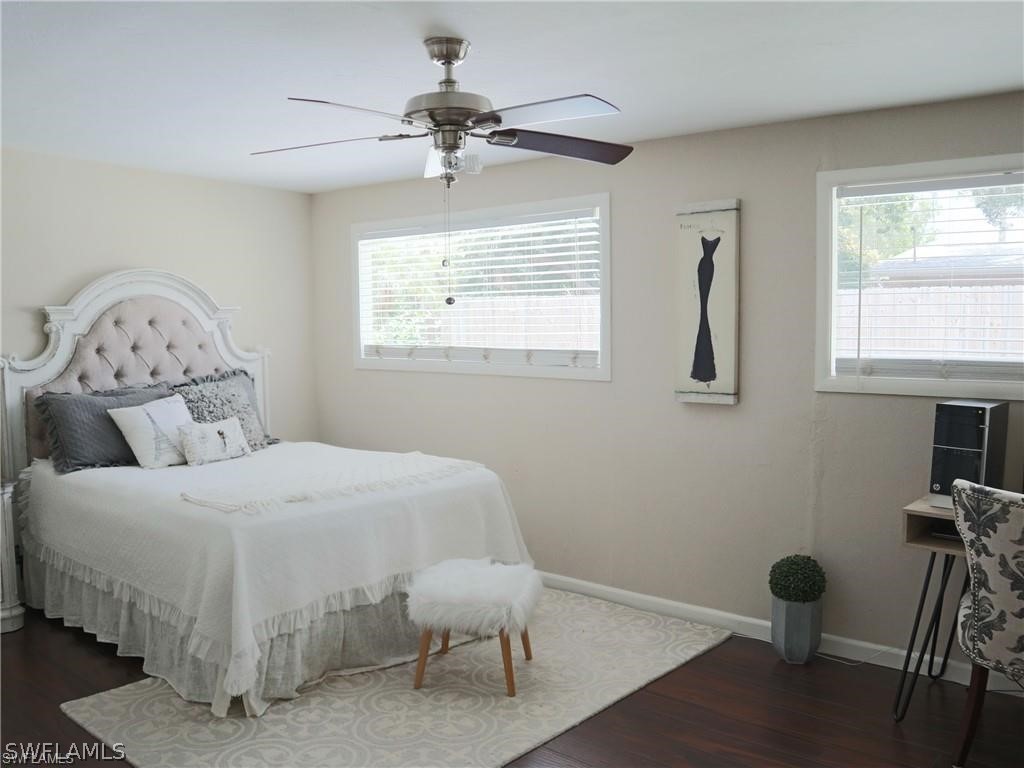 1453 Mandel Road Fort Myers, FL 33919 - Photo 10 of 16 a bedroom with a bed and a window