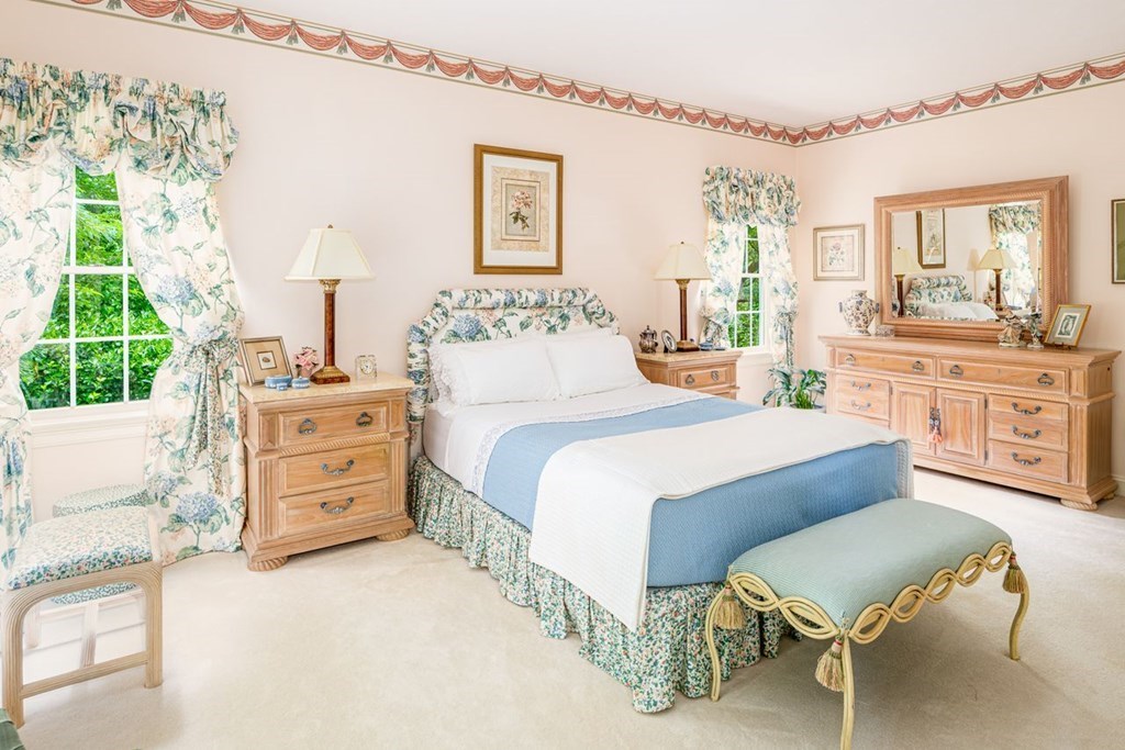 11 Forest Lane, Unit 11 Scituate, MA 02066 - Photo 18 of 39 a bedroom with furniture and a large window