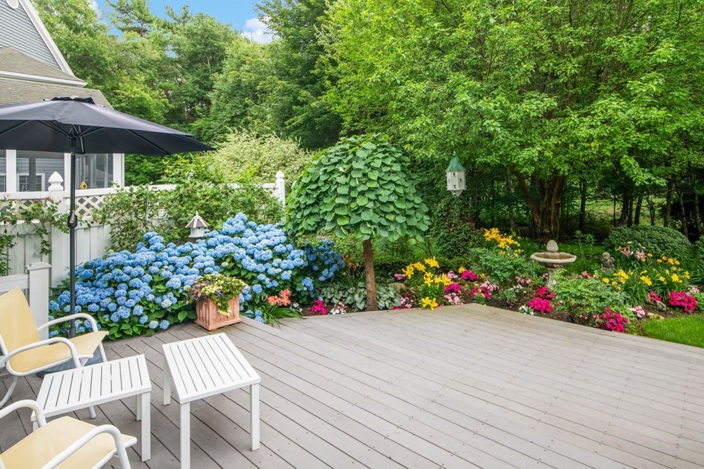 11 Forest Lane, Unit 11 Scituate, MA 02066 - Photo 32 of 39 a view of a table and chairs in patio of the house