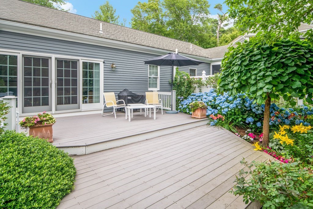 11 Forest Lane, Unit 11 Scituate, MA 02066 - Photo 33 of 39 a house view with a seating space and garden