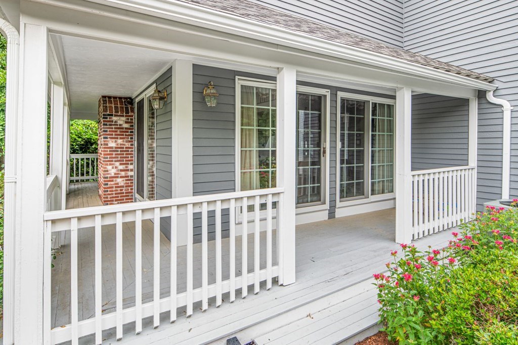 11 Forest Lane, Unit 11 Scituate, MA 02066 - Photo 36 of 39 a view of a house with a small yard and wooden floor and fence