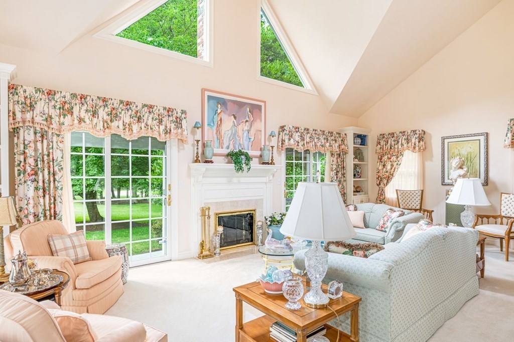 11 Forest Lane, Unit 11 Scituate, MA 02066 - Photo 6 of 39 a living room with furniture and a large window