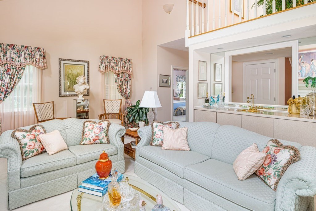 11 Forest Lane, Unit 11 Scituate, MA 02066 - Photo 7 of 39 a living room with furniture and a large window