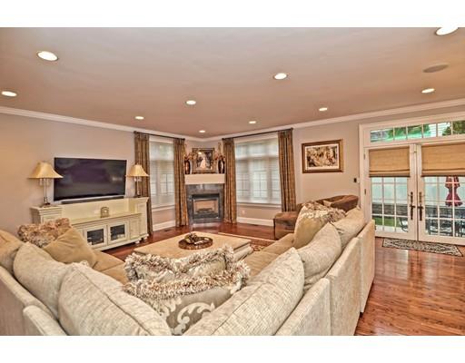 5 Eastham Road Newton, MA 02459 - Photo 8 of 30 a living room with furniture and a flat screen tv