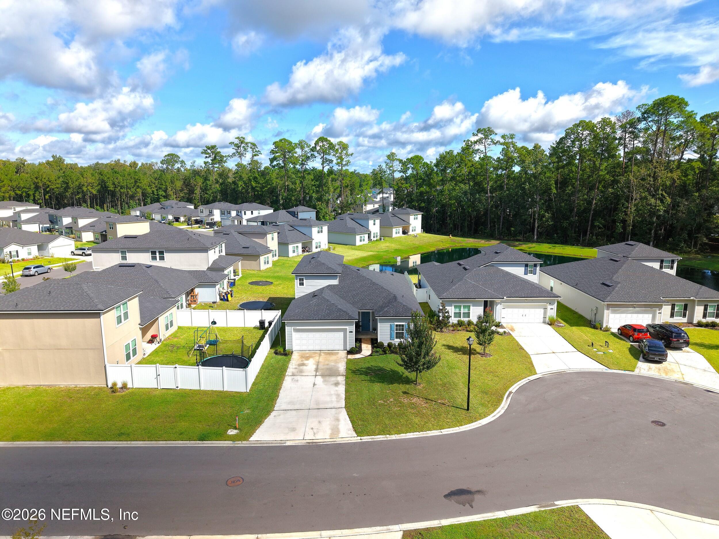 4977 Bramante Drive Jacksonville, FL 32218 - Photo 78 of 85 79_aerial front facade 3