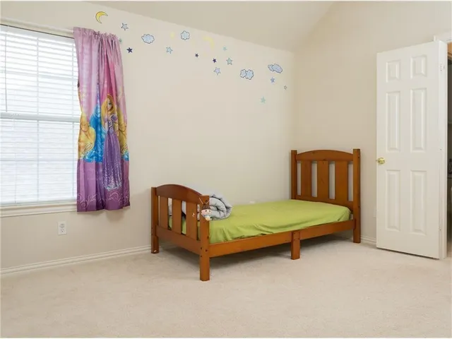 a room with furniture and a window