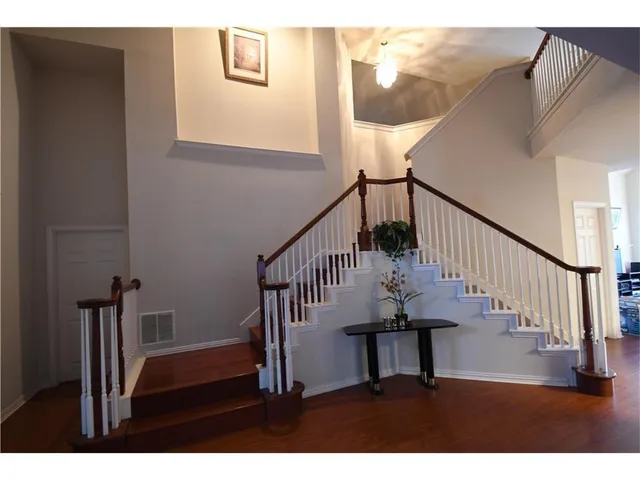 a view of entryway with wooden floor