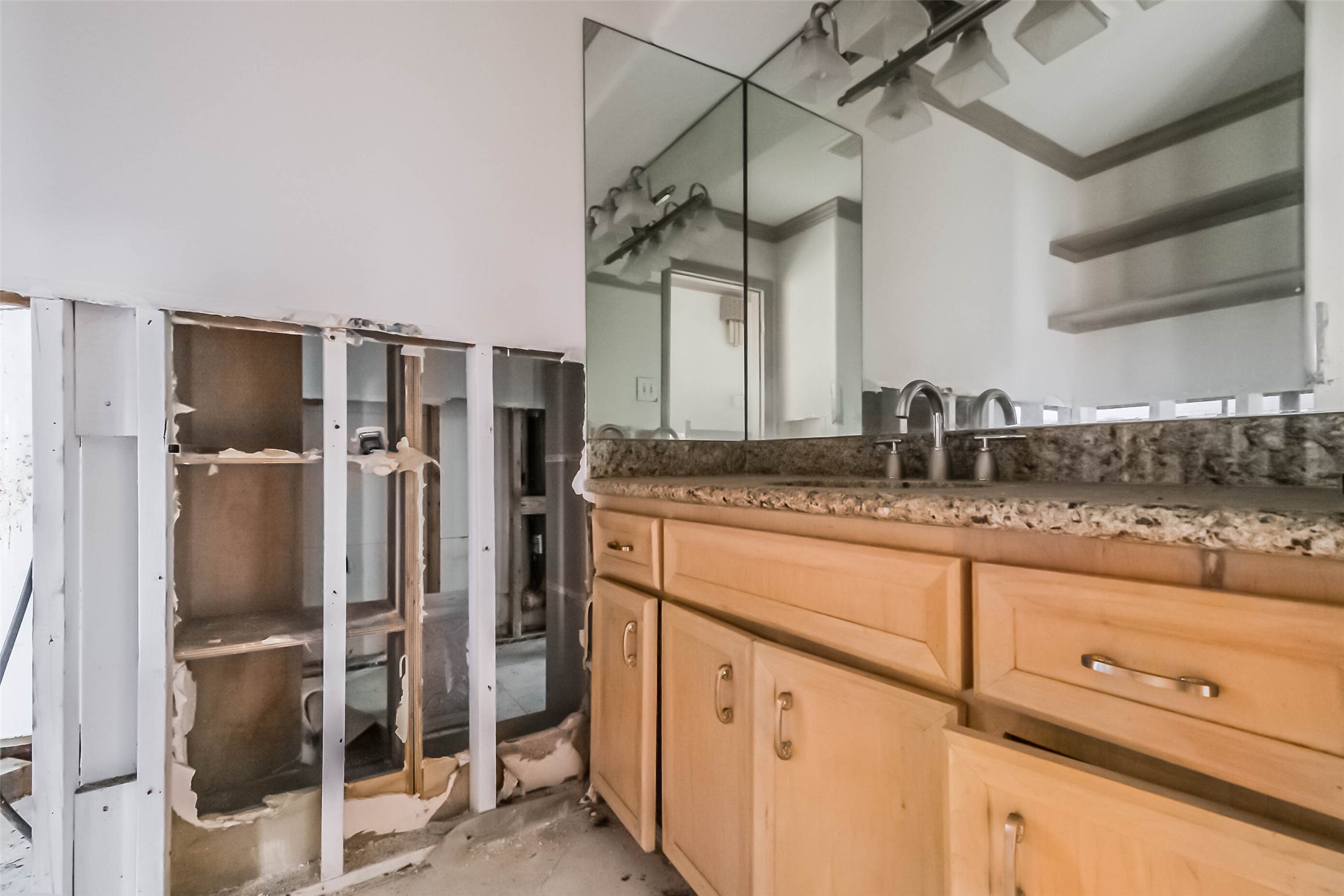 5218 Contour Place Houston, TX 77096 - Photo 14 of 22 a kitchen with stainless steel appliances granite countertop a sink and refrigerator