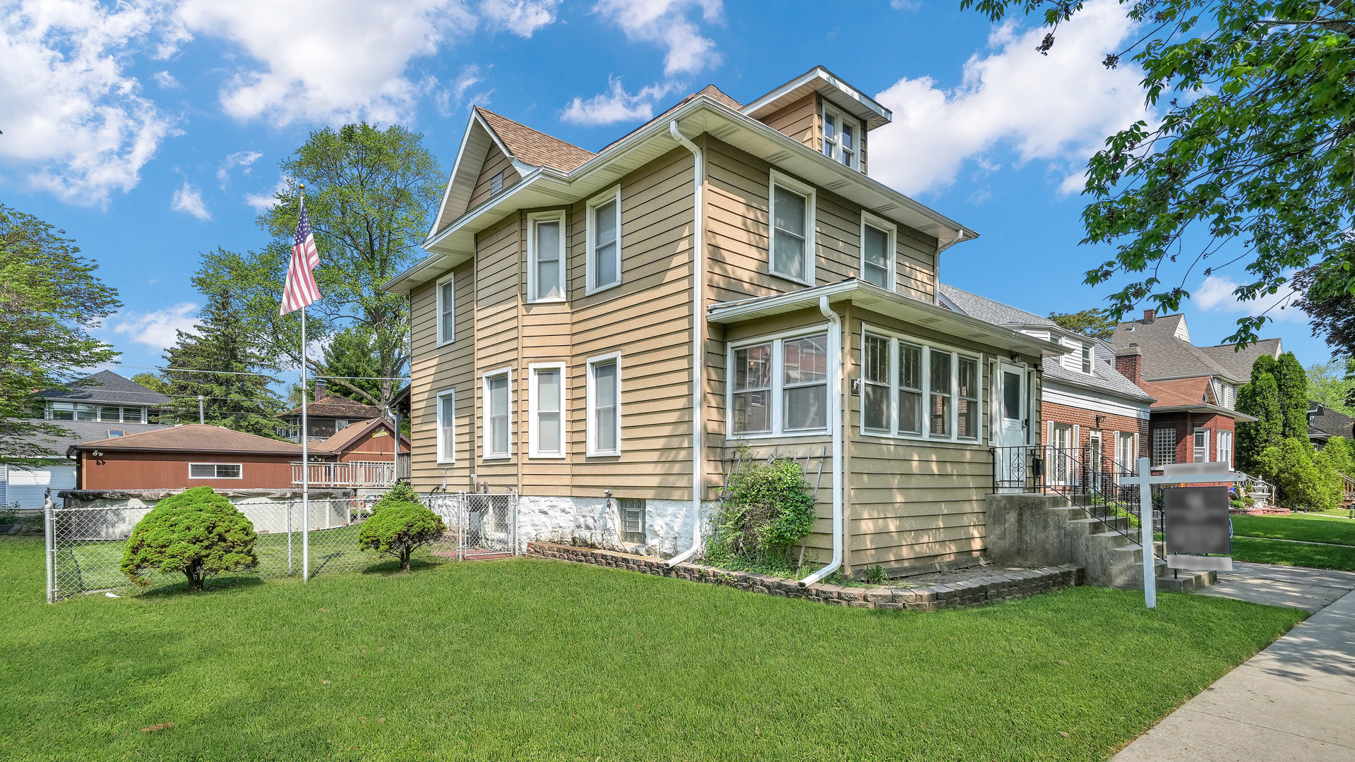 3130 Clinton Avenue Berwyn, IL 60402 - Photo 2 of 30 a front view of a house with a garden