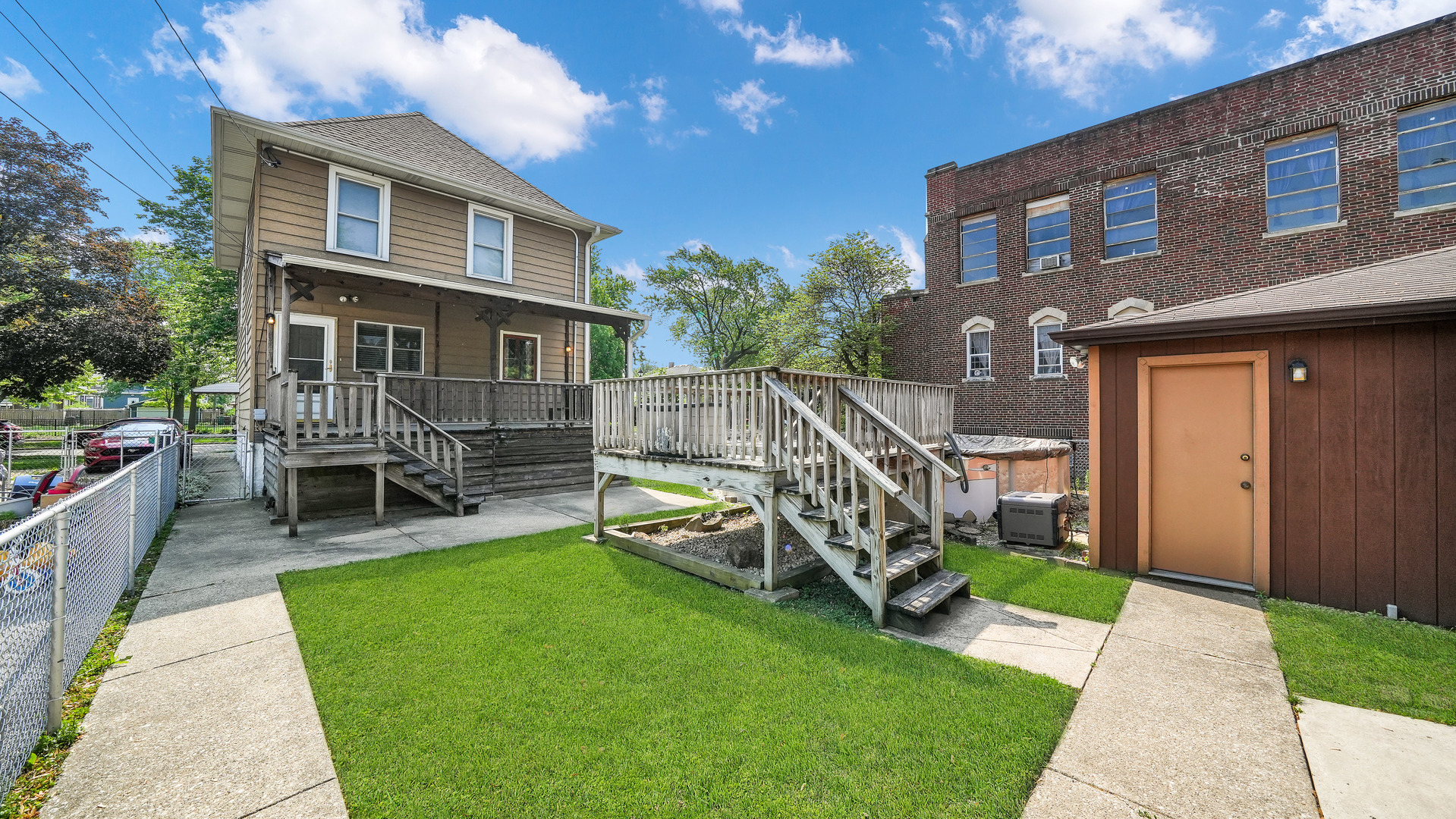 3130 Clinton Avenue Berwyn, IL 60402 - Photo 26 of 30 a view of a house with a backyard and a patio