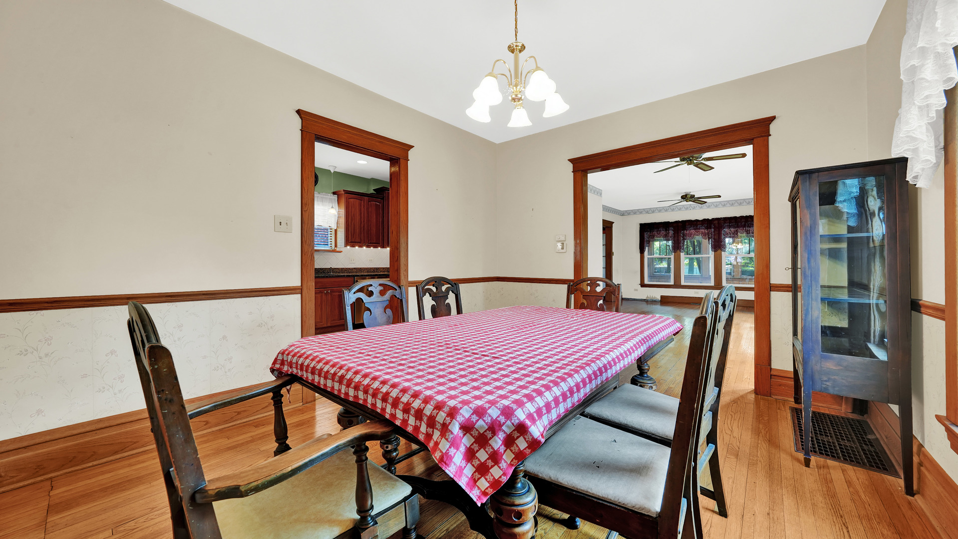 3130 Clinton Avenue Berwyn, IL 60402 - Photo 10 of 30 a view of a dining room with furniture and wooden floor