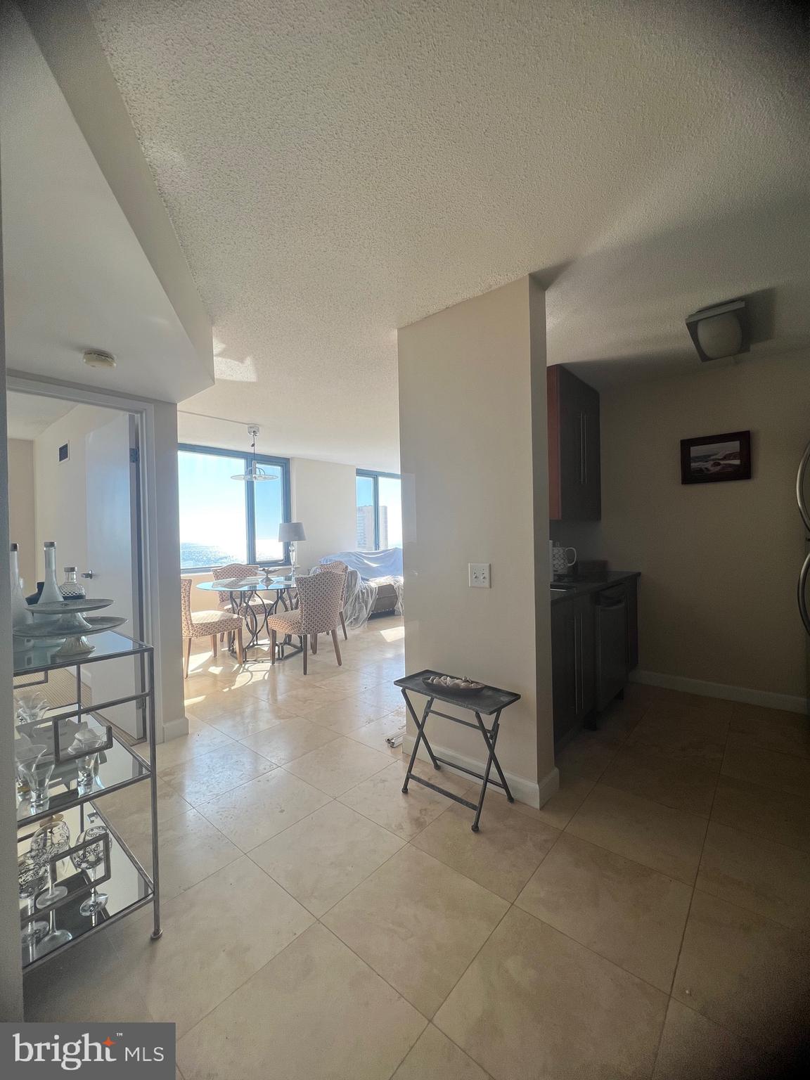 526 Pacific Avenue Atlantic City, NJ 08401 - Photo 12 of 21 a room with lots of dining table and chairs