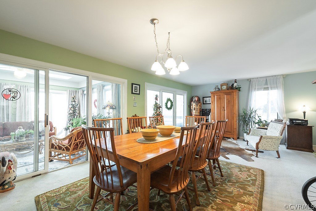 4708 Twin Cedars Road Chester, VA 23831 - Photo 19 of 38 a view of a dining room with furniture window and outside view