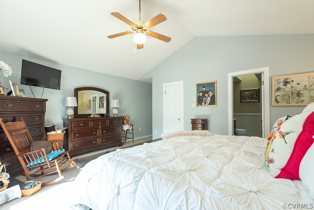 4708 Twin Cedars Road Chester, VA 23831 - Photo 21 of 38 a bedroom with a bed and a flat screen tv