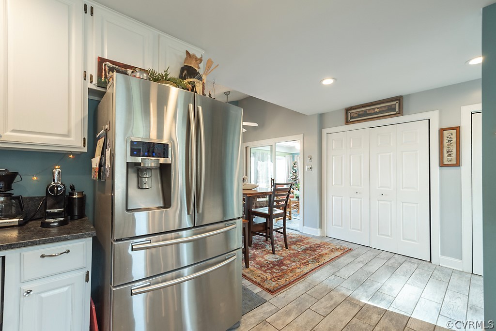 4708 Twin Cedars Road Chester, VA 23831 - Photo 26 of 38 a kitchen with stainless steel appliances a refrigerator and cabinets